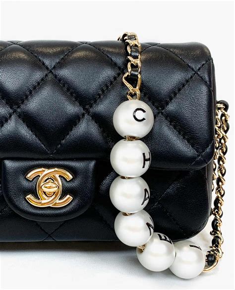 black chanel bag with pearls|chanel bag with pearls strap.